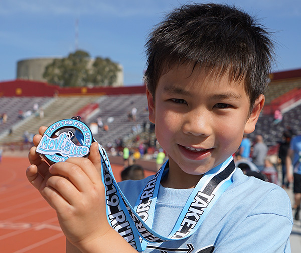 boy with medal